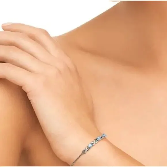 R H Macys co fine jewelry genuine blue topaz bracelet sterling silver New In Box